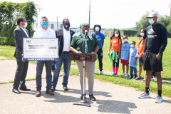 August 25, 2021: Sen. Sharif Street presents a check  to the Shane Victorino Nicetown Boys and Girls Club to rehab a field adjacent to the club to provide safe outdoor recreation for its members.  The club was renamed after the former Phillies centerfielder’s foundation committed $1 million to rehab the indoor facility a decade ago.