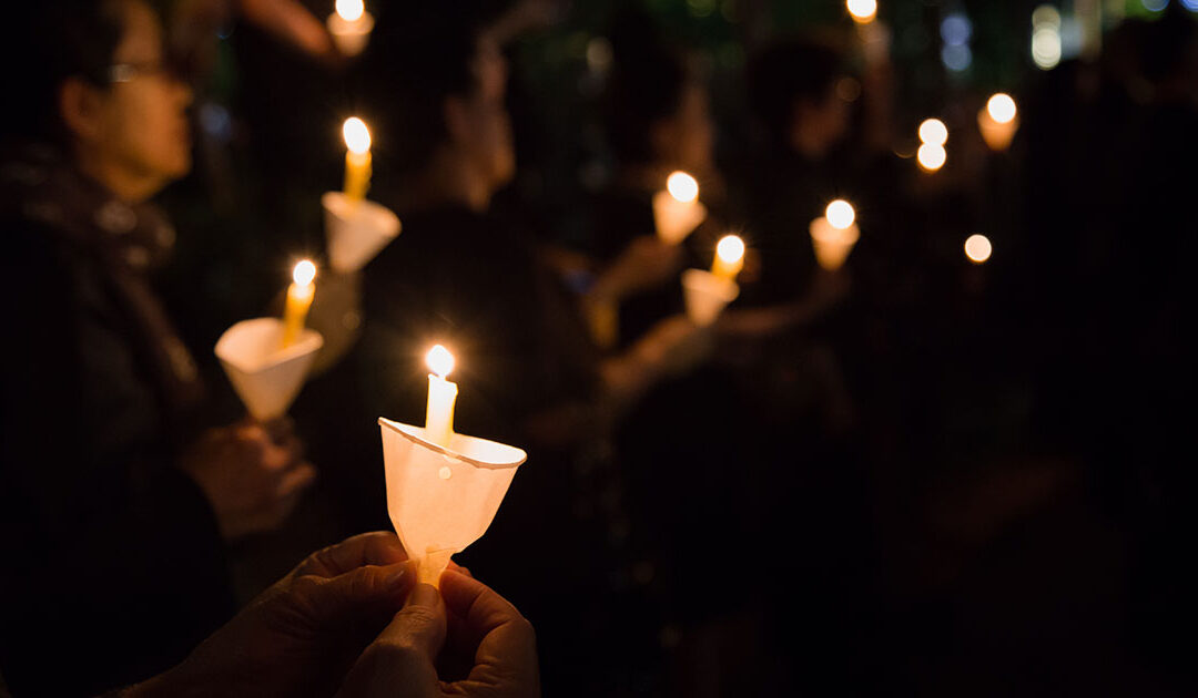candlelight vigil Senator Sharif Street